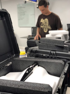 man packing uav